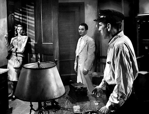 Harry Morgan in To Have and Have Not after choosing to join the fight
